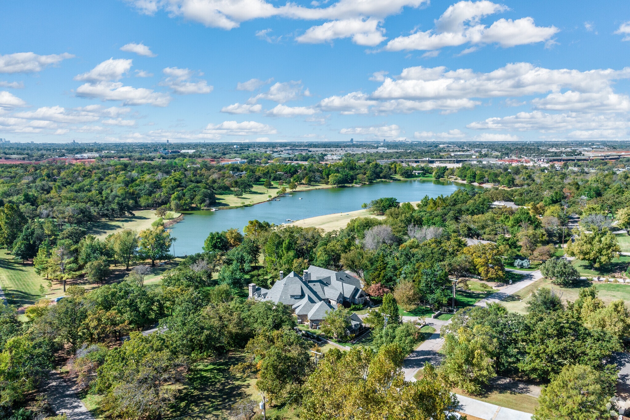 The houses in Lake Aluma are shrouded in beautiful, tall oaks.