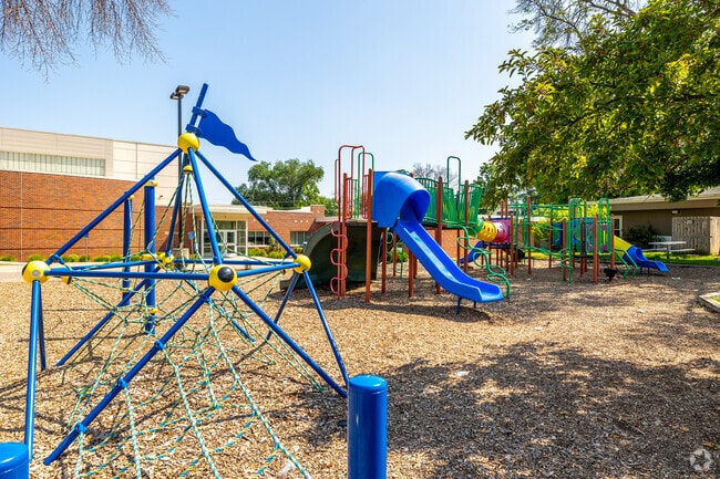 Students at Holy Family enjoy a modern playground and obstacle course during recess.