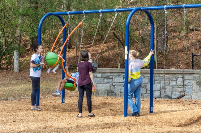Henderson Park in Tucker has brand new swings and a large playground for the kids.