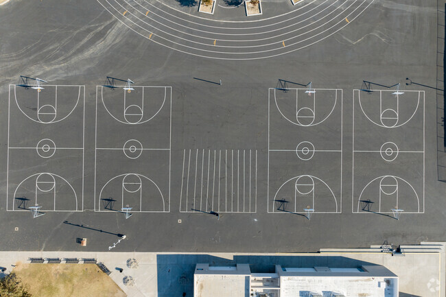 The Basketball courts are found on the Eastside of the school grounds at Walter W Stiern.