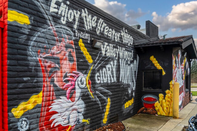 Some businesses have local artists help with advertising in the South Side neighborhood.