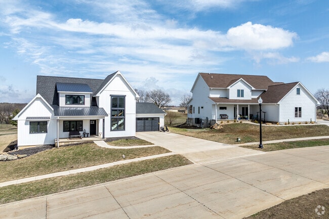 Custom homes are popping up in developments like this one on Waverly's south side.