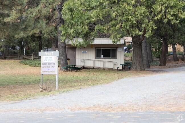 There are 13 students at Divide High School.