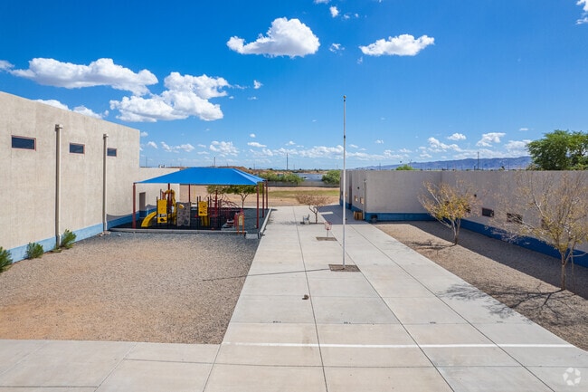 Kids having a blast on the playground at Riverbend Prep in Laveen.