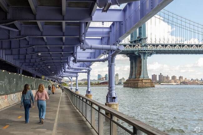 Taking a scenic stroll along East River Esplanade in Two Bridges.