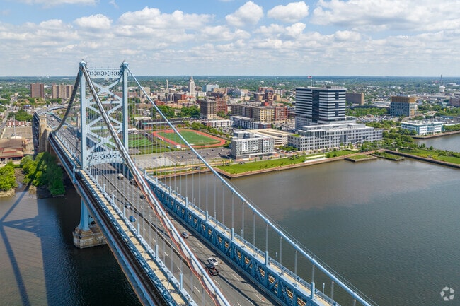Cross the Ben Franklin Bridge from Philadelphia into Downtown Camden.