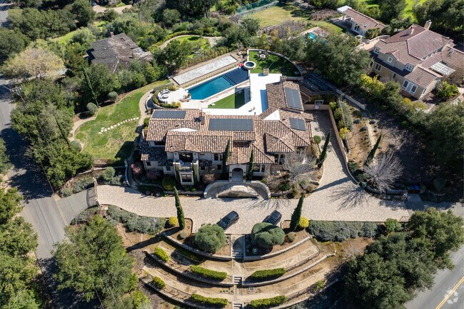This expansive estate in Los Altos Hills showcases the area’s massive lot sizes and luxury living.