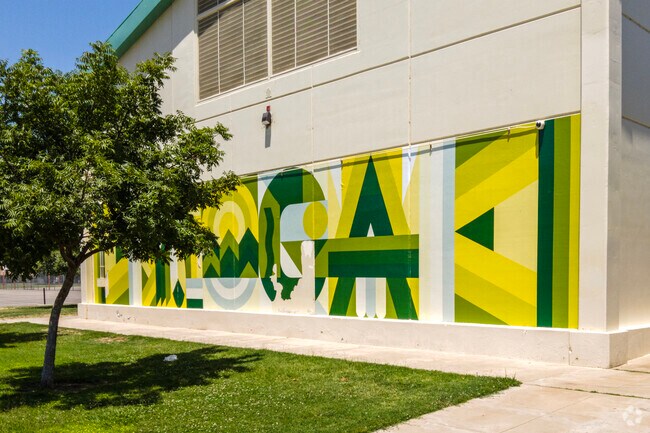 A colorful wall mural decorates Tioga Middle School in he Hoover neighborhood of Fresno.