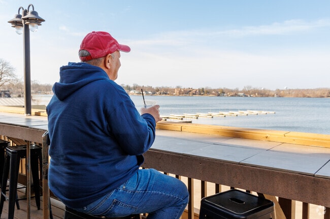 Wauconda resident is enjoying a drink with a view at Docks Bar & Grill.