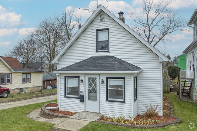 Many homes in Belmont have enough space for homeowners to host a backyard neighborhood cookout.