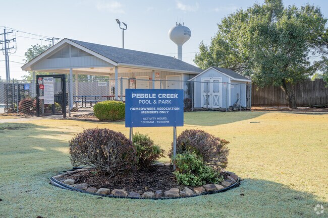 HOA of Pebble Creek offers a pool and park for their residents.