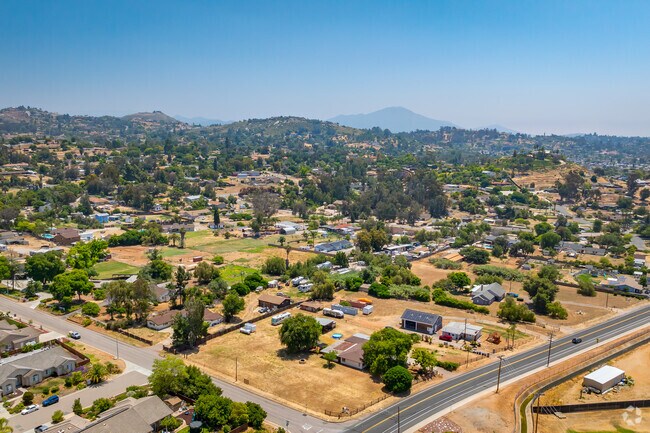 An elevated view above Granite Hills shows large lots with mountain views.