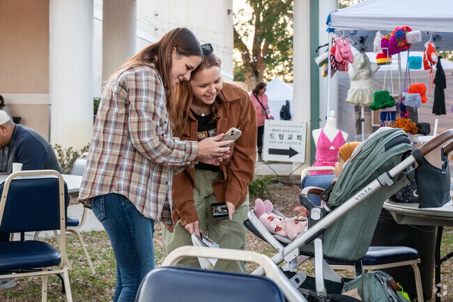 Families stop for a photo op during the Tampa Bay Coffee & Art Festival.