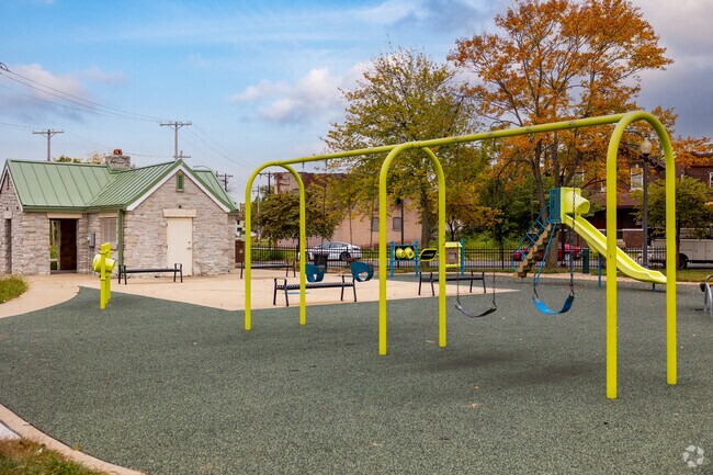 Turner Park includes a playground with a soft mat for safe play.