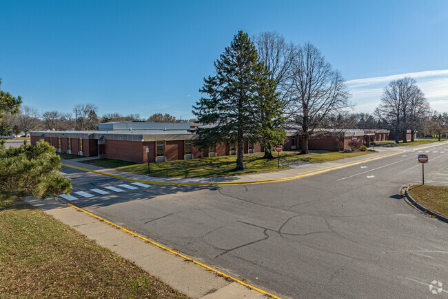 Armstrong Elementary has large trees out front.