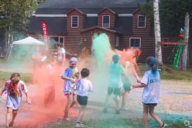 During the annual color race folks in Patten get covered in bright color chalk.