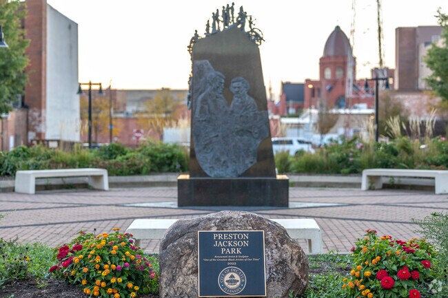 The statue and plaque at Preston Jackson Park honor history while inviting reflection.