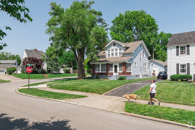 Residents in Sunset-Park Place enjoy wide sidewalks and well-maintained lawns—perfect for evening walks.