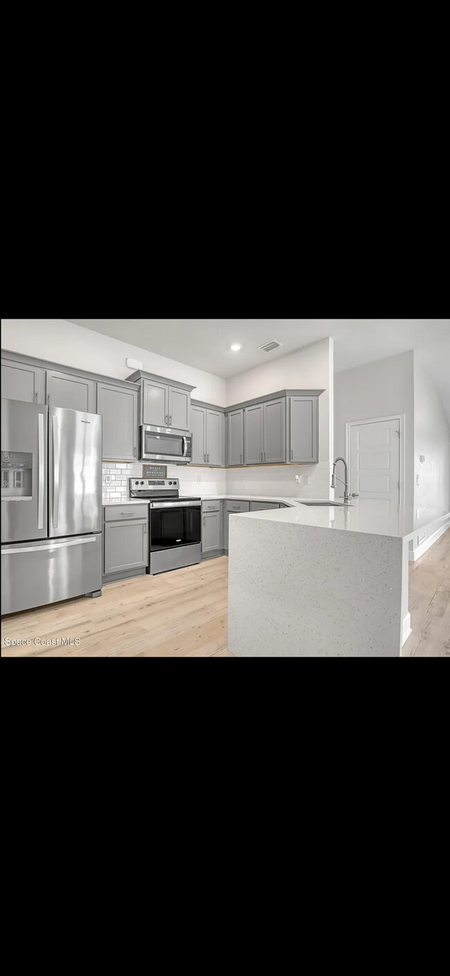 2438 Bonnyton Ln NW, Palm Bay, FL 32907 - photo 5