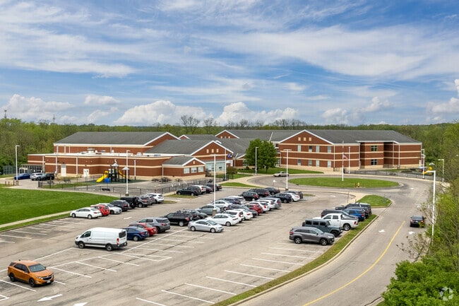 Roll Hill School in East Westwood encourages positive student behavior with coupons for the school store and quarterly skating parties.
