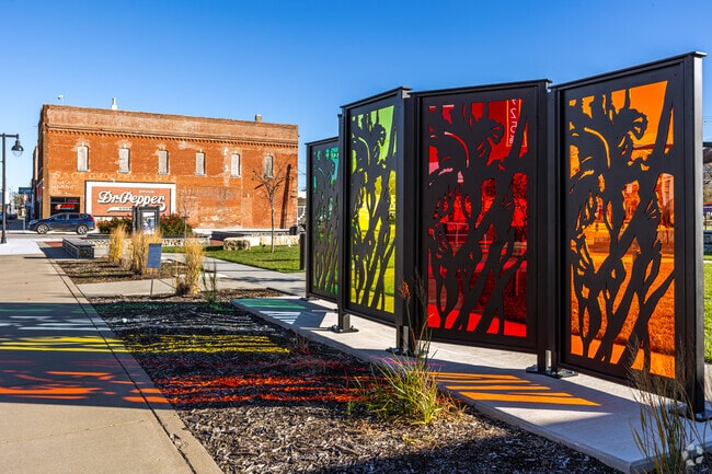 The North Topeka Redbud Park calls visitors with bright colors, events and greenery.