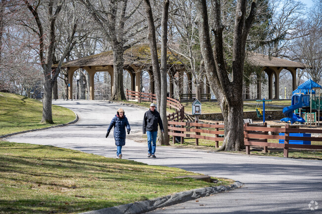 Enjoy a sunny walk with your significant other at Capron Park located in Attleboro, MA.
