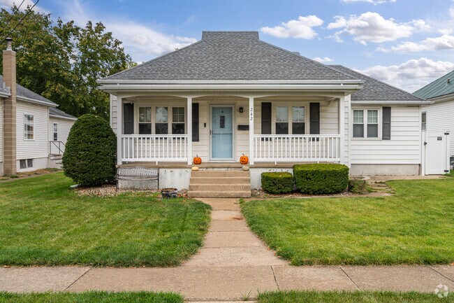 Quaint porch accents a bungalow-style home in Oglesby.