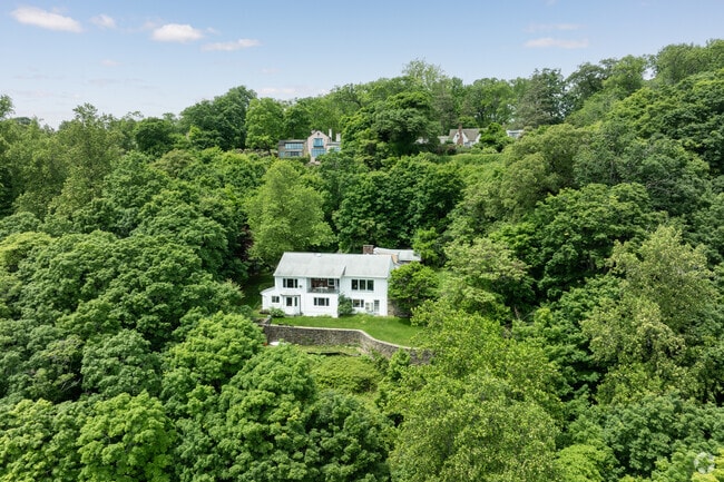 Many homes in Palisades are perched high above the Hudson River.