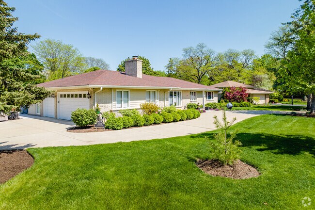 Ranch homes with large driveways and expansive yards can be found throughout Creekside.