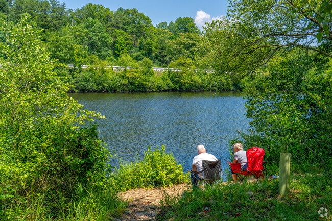 The Lehigh River flows past forested banks in a quiet stretch near Bowmanstown.