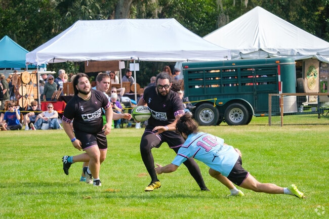 A rugby match takes place at the Scottish Highland Games in Winter Springs.