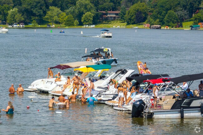 Petite Lake residents are known to hang out at the sandbar.