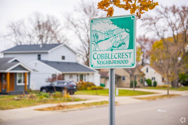 The Cobblecrest neighborhood sign welcomes people into the neighborhood.