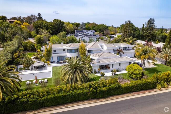 This large modern home sits along the outskirts of the Barron Park neighborhood.