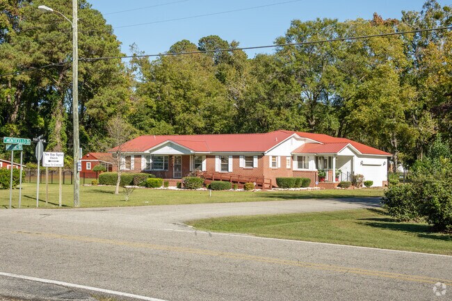 Single family homes sit on moderate plots of land in Brookgreen Park.