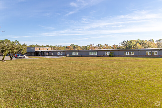 Escatawpa Upper Elementary School has large amounts of green space to play on.