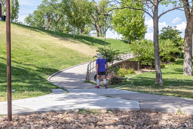 Highland Park in Albuquerque features vintage play gear and lush ivy-covered paths.