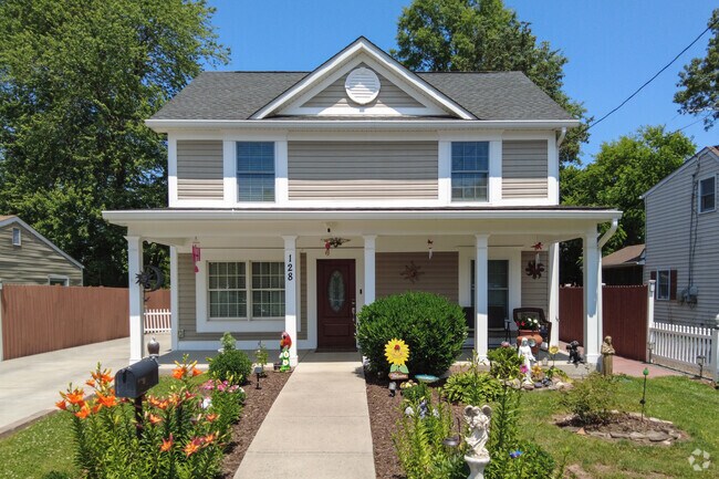 Beautifully landscaped colonial homes are commonly found in Yorkshire neighborhood.