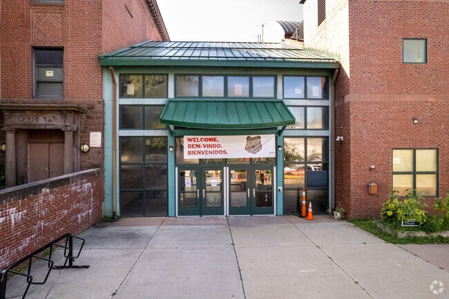 A welcome sign in multiple languages celebrates diversity at McDonough Middle School.