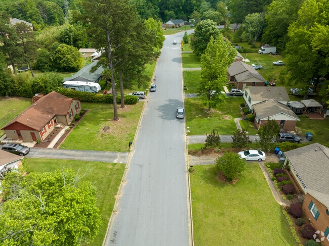Camelot has narrow streets with homes close together but with deep yards.