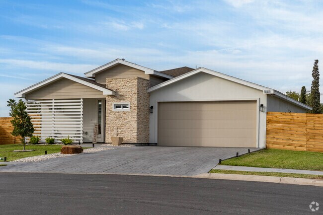 Modern style home with brick accent and wood porch located in San Juan.