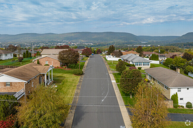 Split-levels and bi-levels with a view are located in the hills of Hughestown.