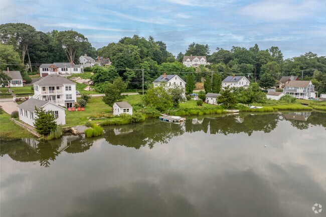 Rows of waterfront homes line the cost of Mystic Historic District.