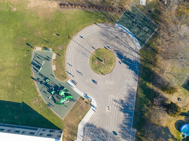 Students enjoy recess on the playground which is held near the back of the school.
