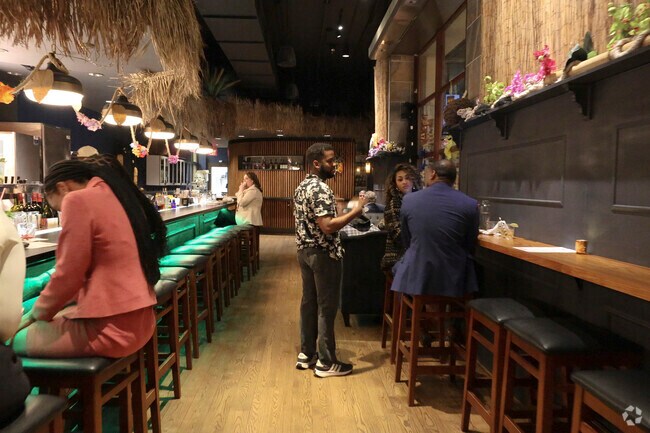 Friends gather for a fun night at Bourbon, a Cajun-Creole restaurant in Arsenal Hill.