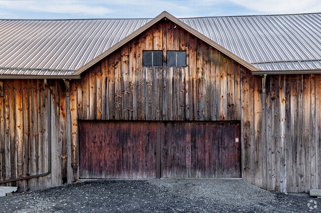 A rustic barn towers over the street in Bell Township.