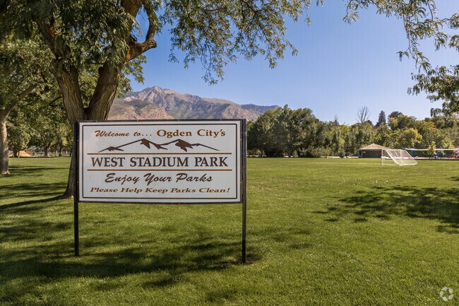 Beautiful view of the mountains serving as a background to the sign at West Stadium Park.