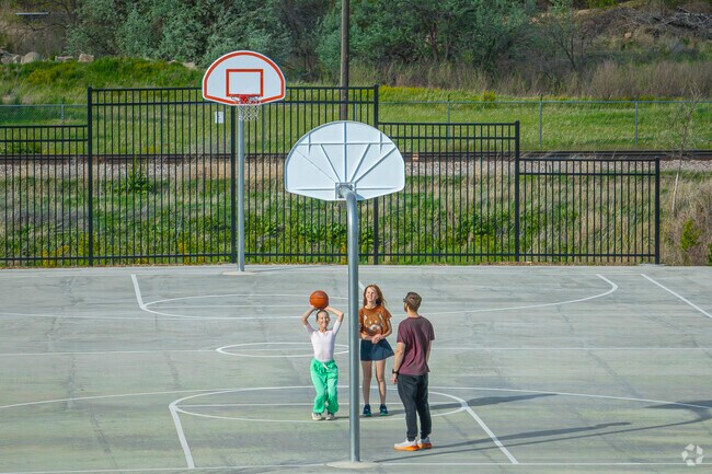 At Bucking Horse, Colorado, the basketball courts are where neighbors meet for pickup games, kids play until sunset, and weekend fun happens on full display in a welcoming, sporty community vibe.