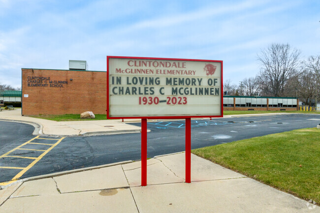 The sign commemorates Charles C. McGlinnen School.