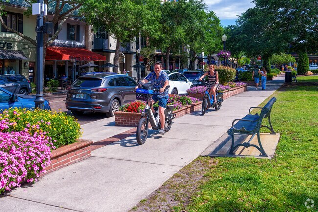 Orwin Manor residents enjoy Park Avenue strolls on electric bikes.